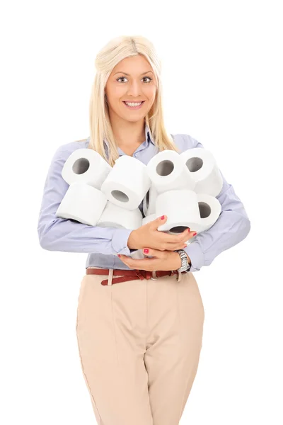 Woman holding toilet paper rolls — Stock Photo, Image