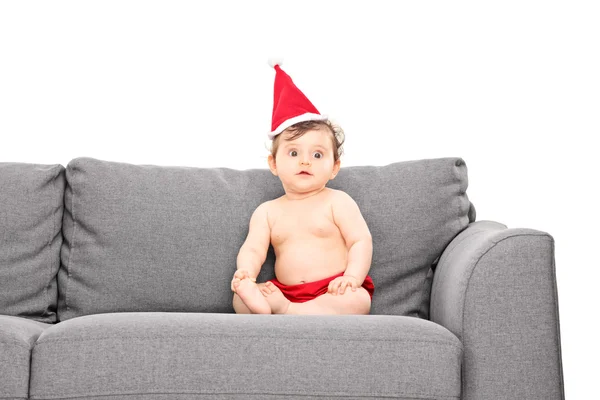 Noel Baba şapkası ile kız bebek — Stok fotoğraf