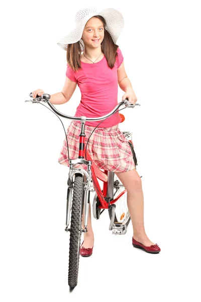 Girl with hat on bike — Stock Photo, Image