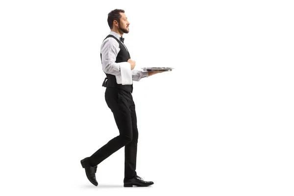 Full Length Profile Shot Waiter Carrying Silver Tray Walking Isolated — Stock Photo, Image