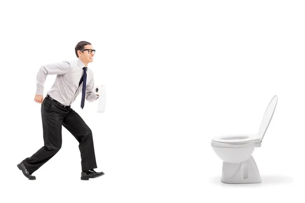 Mann eilt zum Urinal — Stockfoto