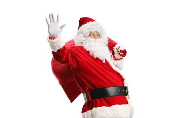 Santa Claus Mává Nese Pytel Dárky Izolované Bílém Pozadí — Stock fotografie