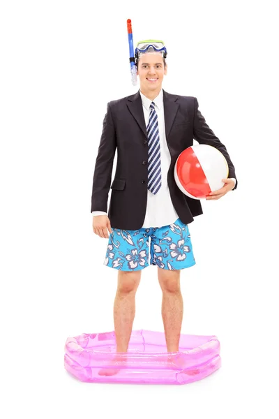 Businessman with snorkel in small pool — Stock Photo, Image