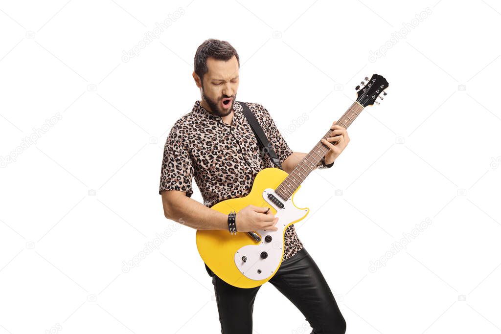 Male musician in a leopard print shirt playing an electric guitar isolated on white background