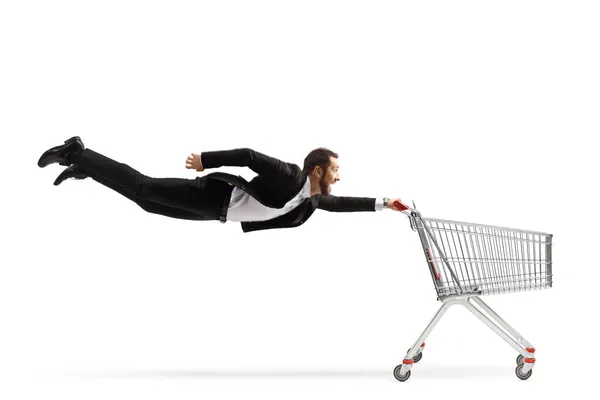 Full Length Shot Businessman Flying Holding Empty Shopping Cart Isolated — Stock Photo, Image