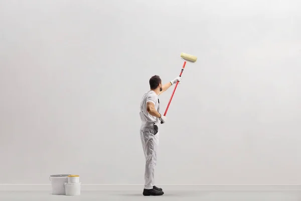 Painter Using Paint Roller Painting Wall Isolated White Background — Stock Photo, Image
