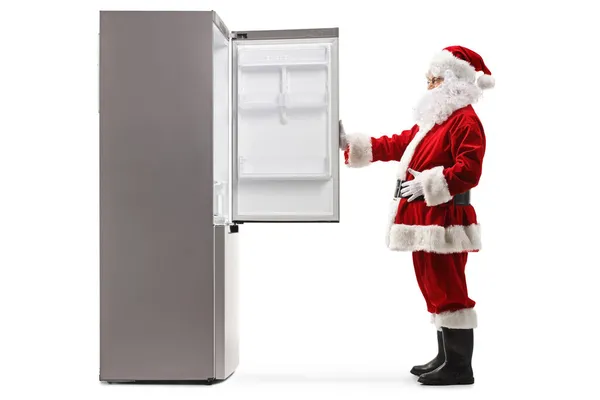 Full Length Profile Shot Santa Claus Opening Empty Fridge Isolated — Stock Photo, Image