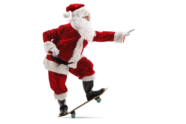 Full Length Profil Záběr Šťastný Santa Claus Skateboardu Izolované Bílém — Stock fotografie