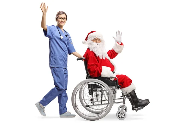 Foto Perfil Completo Una Enfermera Empujando Santa Claus Una Silla — Foto de Stock