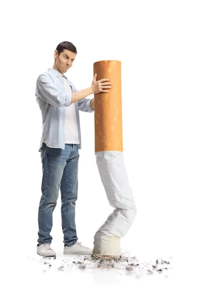 Joven Enojado Posponiendo Gran Cigarrillo Aislado Sobre Fondo Blanco — Foto de Stock