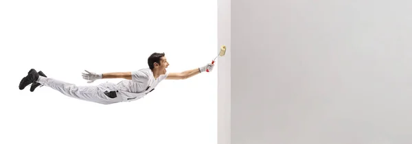 Casa Pittore Volare Dipingere Muro Con Rullo Isolato Sfondo Bianco — Foto Stock