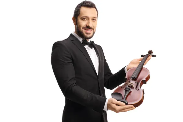 若いですエレガントな男性バイオリニスト保持Aヴァイオリン隔離上の白い背景 — ストック写真