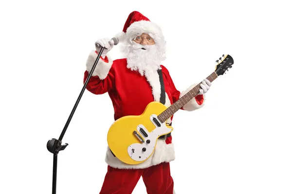 Άγιος Βασίλης Παίζει Ηλεκτρική Κιθάρα Και Τραγουδάει Μικρόφωνο Απομονωμένο Λευκό — Φωτογραφία Αρχείου
