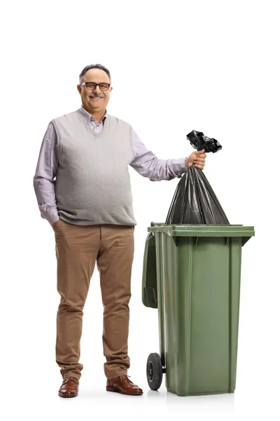 Full Length Portrait Mature Man Throwing Black Plastic Bag Bin — Stock Photo, Image