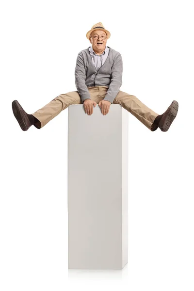 Cheerful Elderly Man Sitting Tall White Column Isolated White Background — Stock Photo, Image