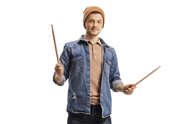 Tiener Man Muzikant Houden Drumsticks Geïsoleerd Een Blauwe Achtergrond — Stockfoto