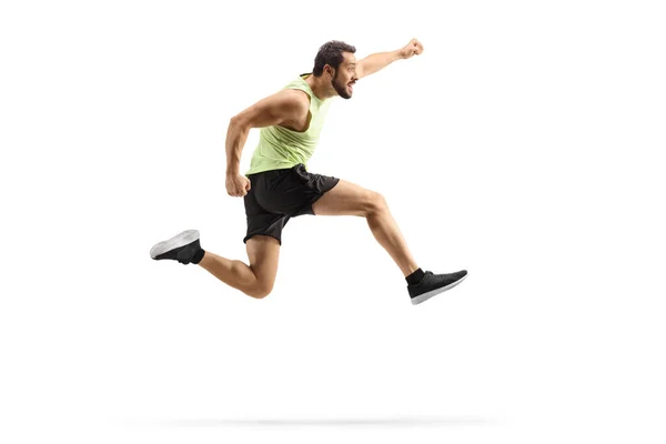 Full Length Profile Shot Young Fit Man Sportswear Jumping Gesturing — Stock Photo, Image