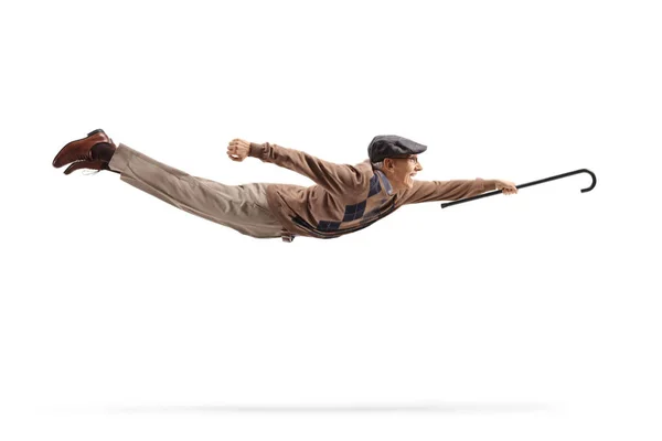 Hombre Mayor Volando Sosteniendo Bastón Aislado Sobre Fondo Blanco —  Fotos de Stock
