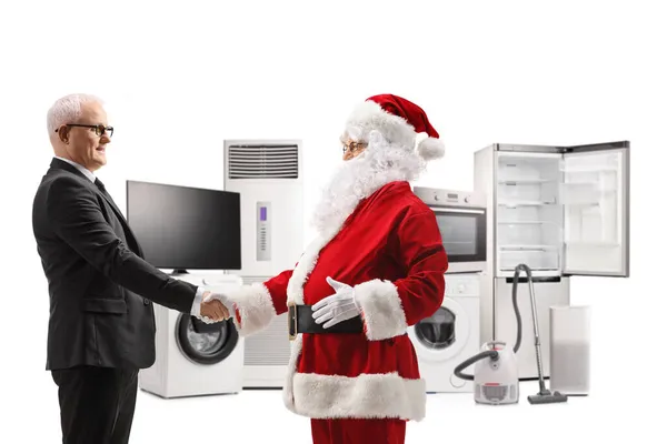 Santa Claus Χειραψία Έναν Επιχειρηματία Διαχειριστή Ένα Κατάστημα Ηλεκτρικών Οικιακών — Φωτογραφία Αρχείου