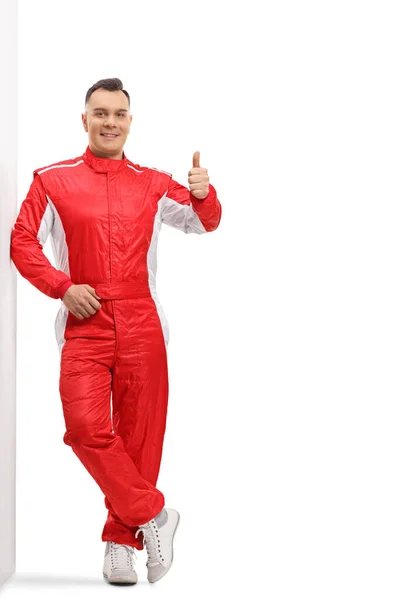 Full Length Portrait Racer Red Overall Suit Leaning Wall Isolated — Stock Photo, Image