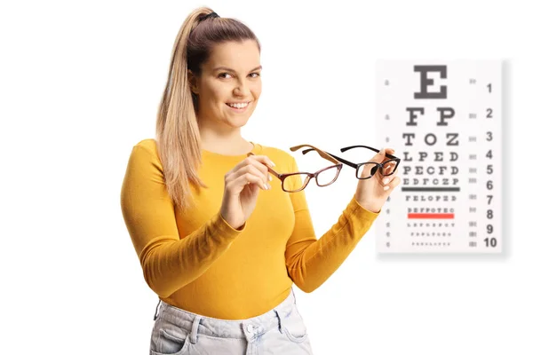 Young Female Holding Two Pairs Glasses Front Vision Test Isolated — Stock Photo, Image