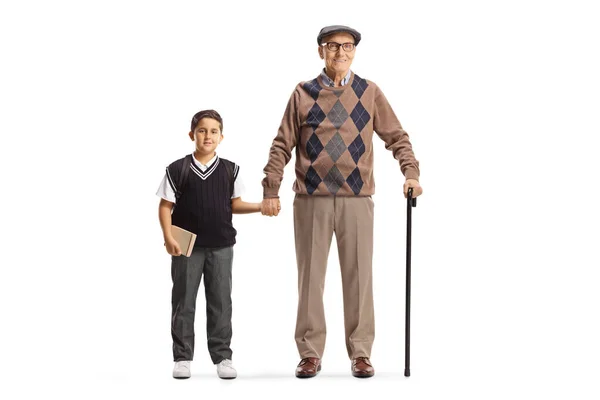 Full Length Portrait Grandfather Grandson School Uniform Standing Holding Hands — Stock Photo, Image