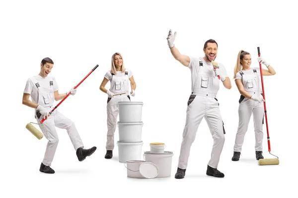 Team Van Huisschilders Dansen Zingen Een Muziekband Geïsoleerd Witte Achtergrond — Stockfoto