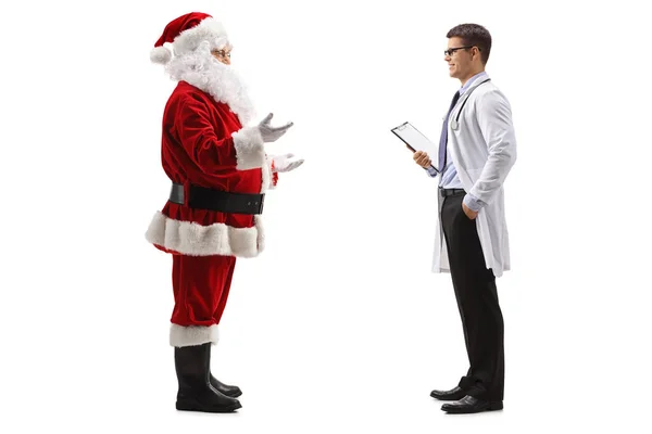 Полнометражный Снимок Разговора Санта Клауса Врачом Мужчиной Изолированным Белом Фоне — стоковое фото