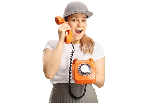 Cheerful Young Female Holding Old Vintage Rotary Phone Isolated White — Fotografia de Stock