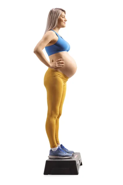Foto Perfil Completo Una Mujer Embarazada Ropa Deportiva Pie Sobre — Foto de Stock