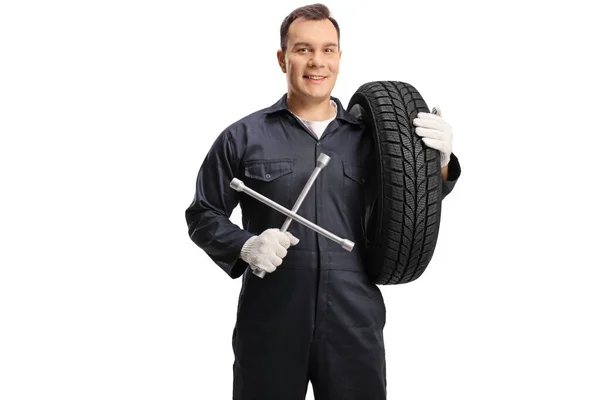 Auto Mechanic Carrying Tire Holding Wrench Tool Isolated White Background — Fotografia de Stock