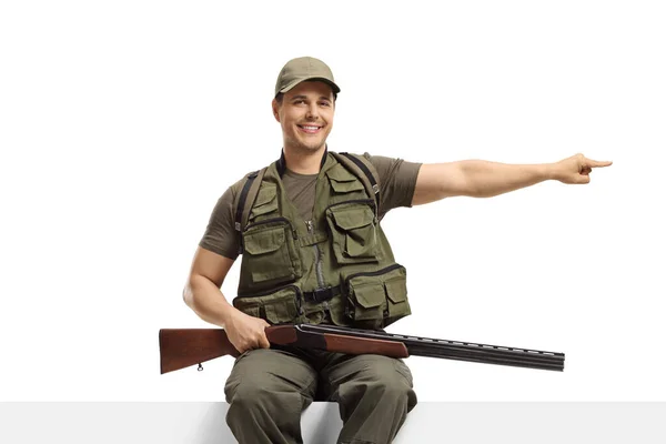 Hunter Rifle Sitting Panel Pointing Side Isolated White Background — стокове фото