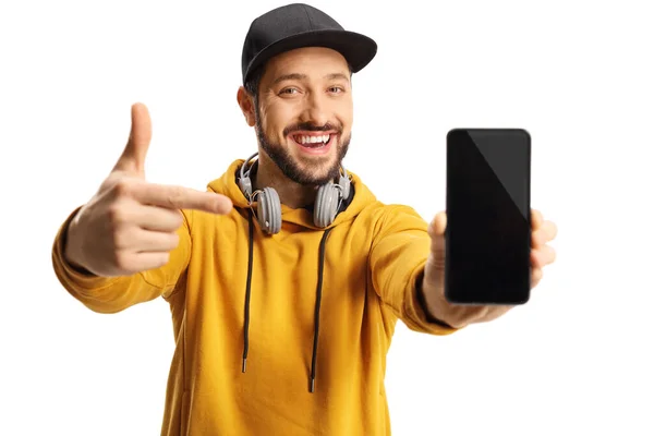 Casual Modern Guy Headphones Cap Holding Smartphone Front Camera Isolated — Foto Stock