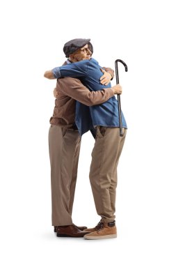 Full length shot of an elderly and young man hugging each other isolated on white background