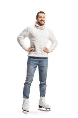 Full length portrait of a casual man standing and wearing ice skates isolated on white background