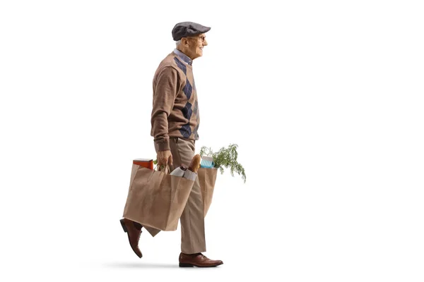 Full Length Profile Shot Elderly Man Carrying Grocery Bags Walking — Stock Photo, Image
