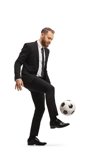 Full Length Shot Businessman Kicking Football Isolated White Background — Stockfoto