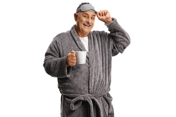 Smiling Mature Man Wearing Grey Robe Sleeping Mask Holding Cup — Stock Photo, Image