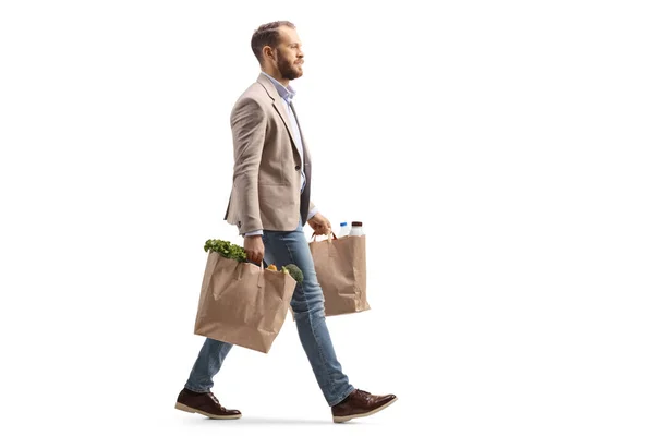 Man Walking Carrying Two Grocery Bags Isolated White Background — Stock Photo, Image