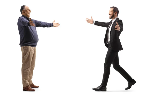 Full Length Profile Shot Mature Man Greeting Businessman Arms Wide — Stock Photo, Image