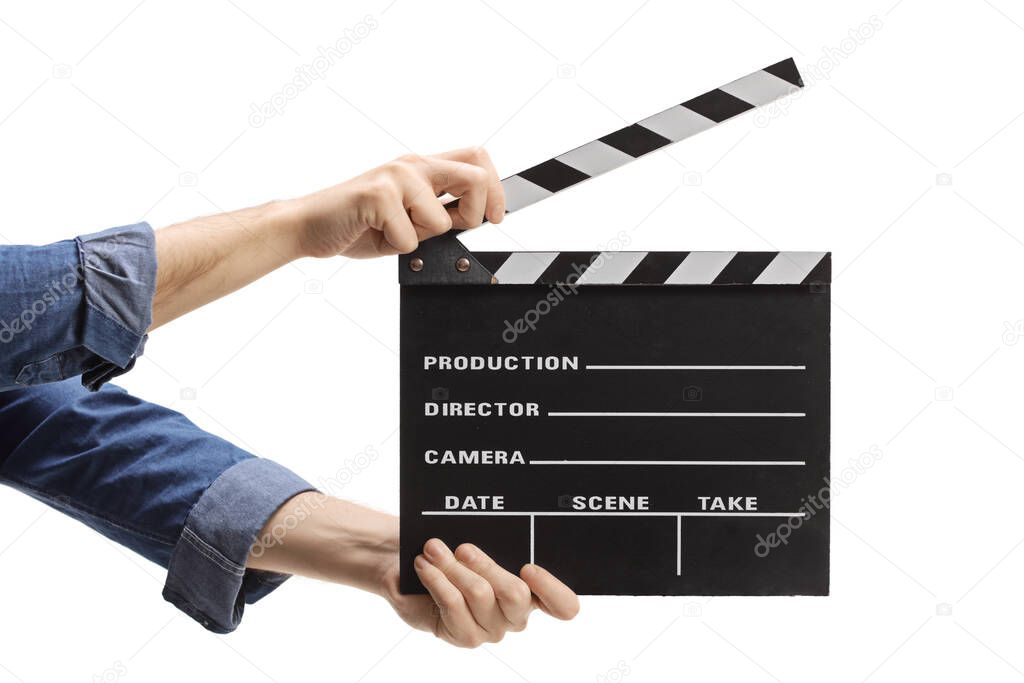Male hands holding a clapper board isolated on white background