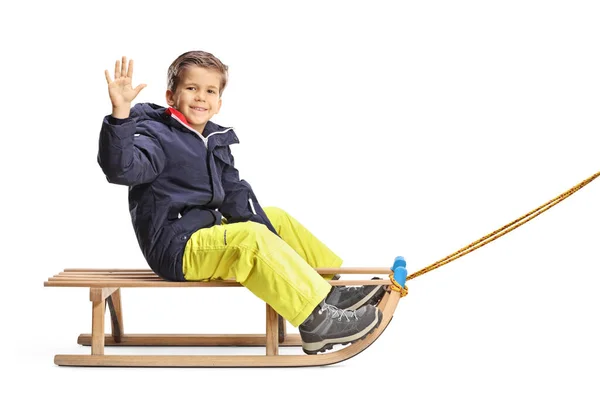 Foto Lengkap Seorang Anak Laki Laki Duduk Atas Kereta Salju — Stok Foto