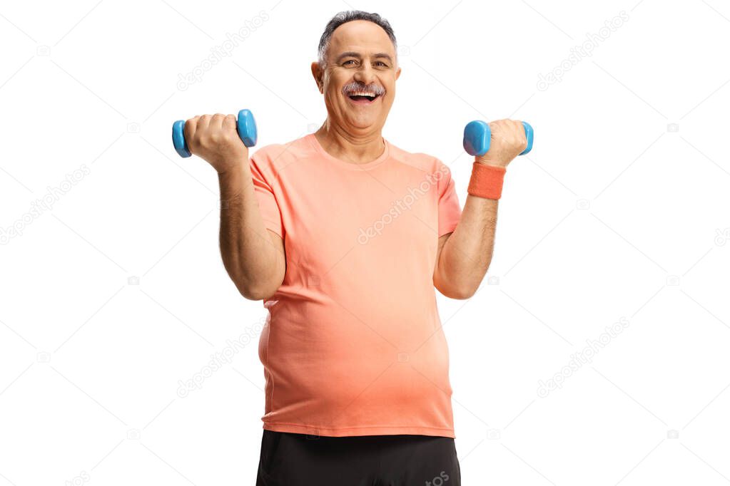 Happy mature man exercising with dumbbells and smiling isolated on white background