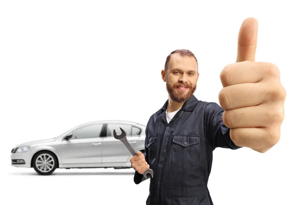 Car Mechanic Gesturing Thumbs Holding Wrench Isolated White Background — Stock Photo, Image