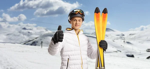 Young Man Holding Pair Skis Gesturing Thumbs Mountain — Stock Photo, Image