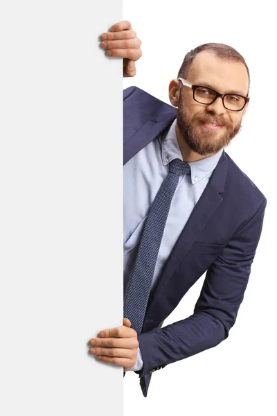 Young Man Glasses Peeking Blank White Panel Isolated White Background — Stock Photo, Image