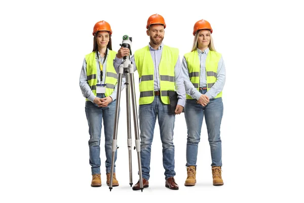 Team Young Geodetic Surveyors Posing Measuring Equipment Isolated White Background — Stock Photo, Image
