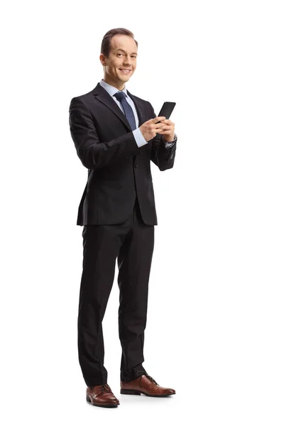 Full Length Shot Smiling Businessman Holding Smartphone Looking Camera Isolated — Stock Photo, Image