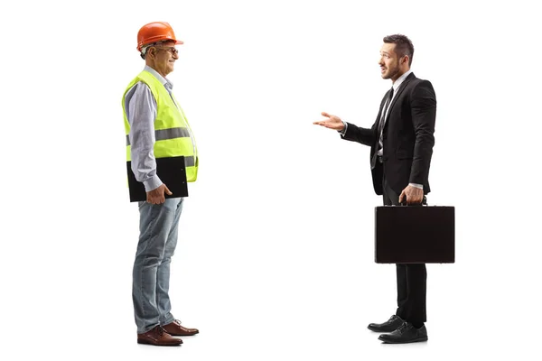 Full Length Profile Shot Businessman Talking Male Engineer Safety Vest — Stock Photo, Image