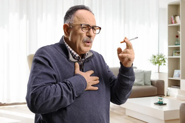 Mature Man Smoking Coughing Home Lving Room — Stock Photo, Image